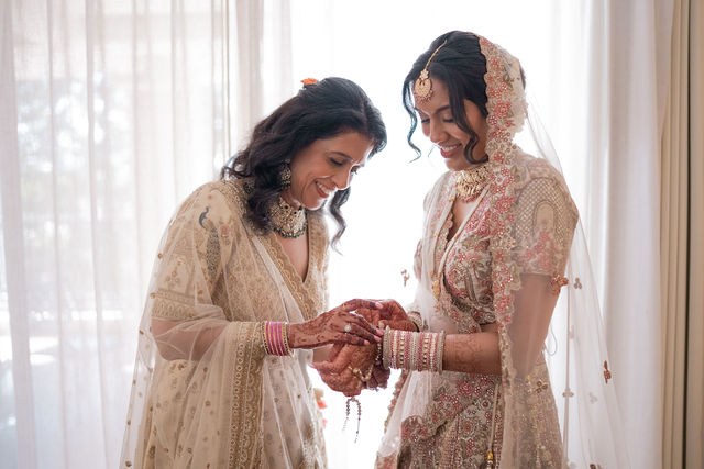 Anika and a loved one sharing a quiet getting-ready moment