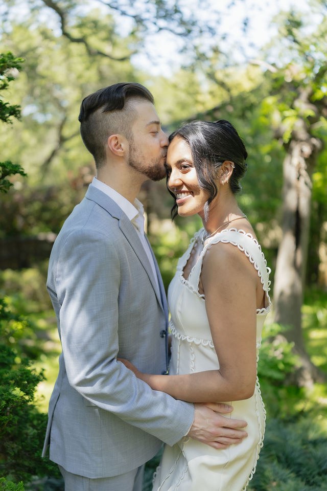 Anika and Caden share a close portrait in the garden