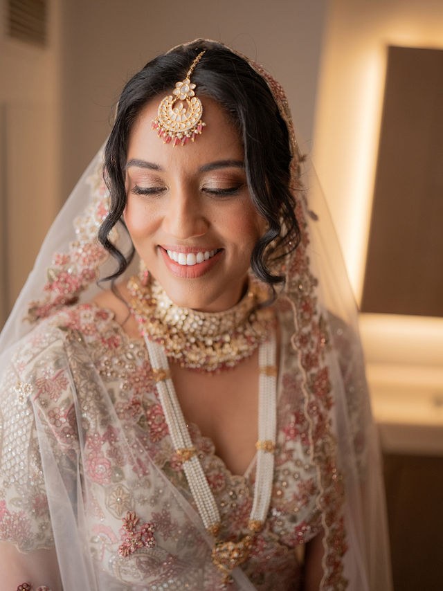 Anika smiling before the ceremony