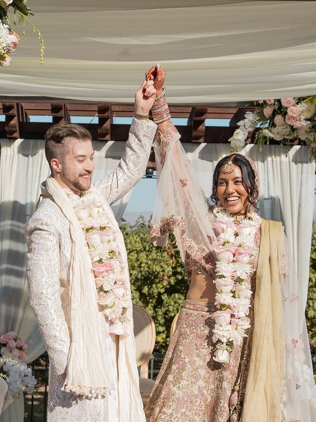 Anika and Caden celebrate together after the ceremony