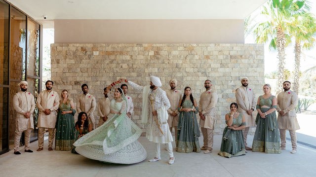 Alisha and Sean celebrating with their wedding party