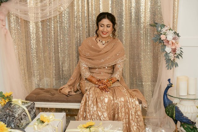Banpreet seated for a family wedding ritual