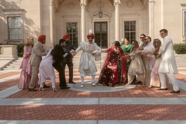 Banpreet and Yugraj with family in the courtyard