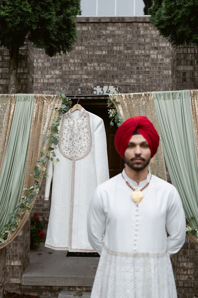Yugraj in his red turban and ivory wedding attire