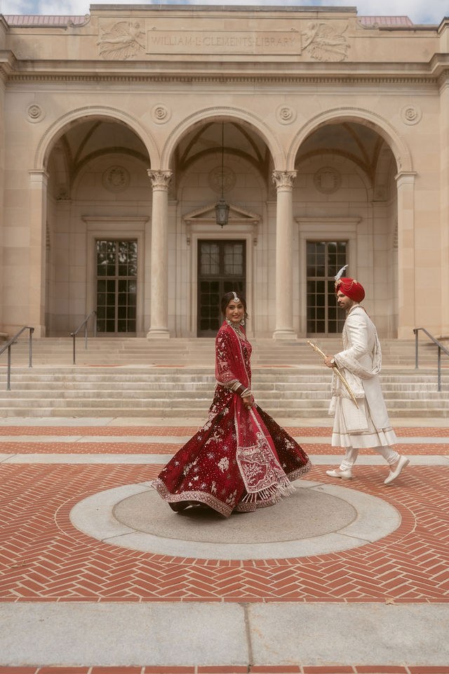 Banpreet and Yugraj crossing the courtyard together