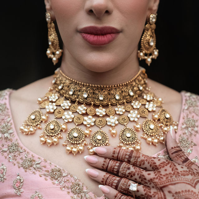 Aman’s jewellery and henna in a close bridal portrait