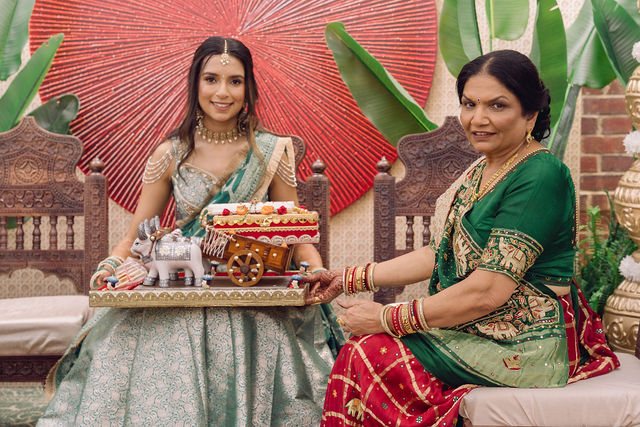 Khyati and a family member together during a home blessing