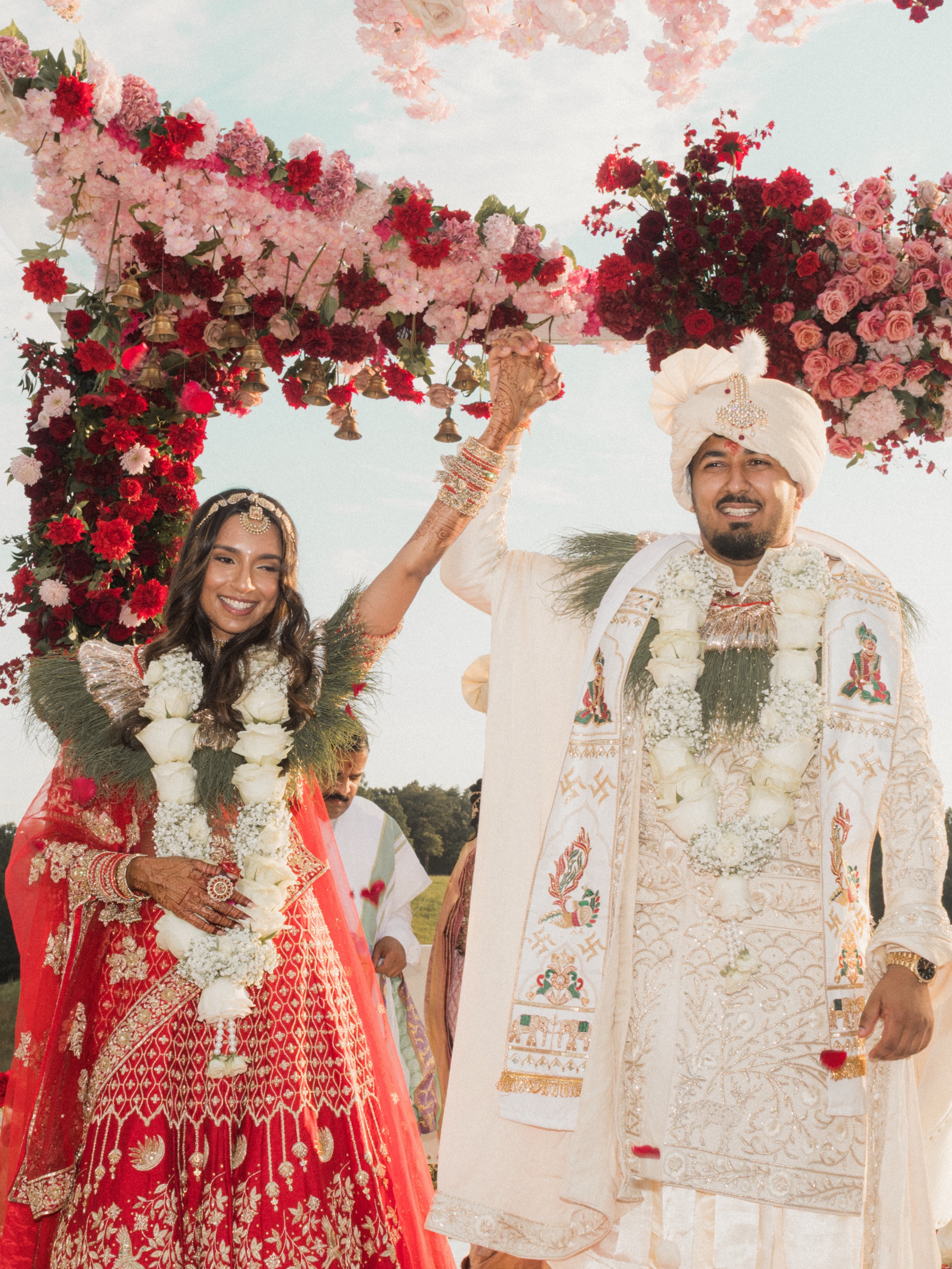 Khyati and Bishal beneath their wedding arch