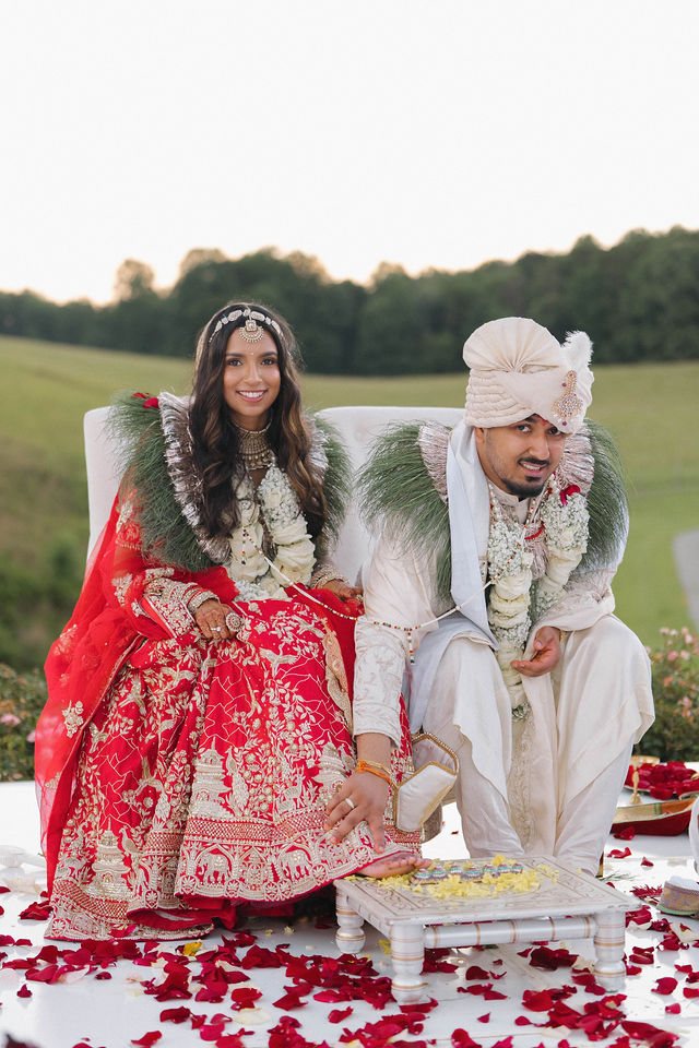 Khyati and Bishal seated together during the wedding ceremony