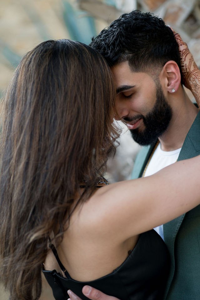 Grace and Karan in a close portrait before their wedding