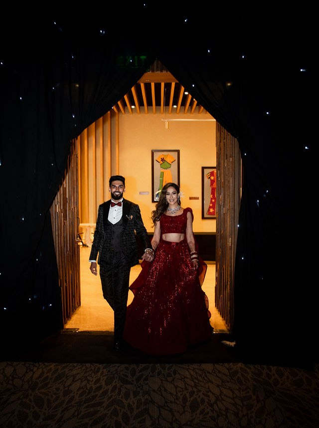 Grace and Karan entering their evening reception