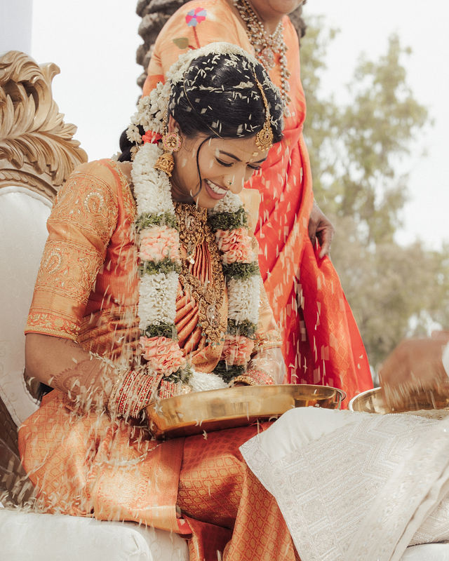 Karishma and Shil during a wedding ritual