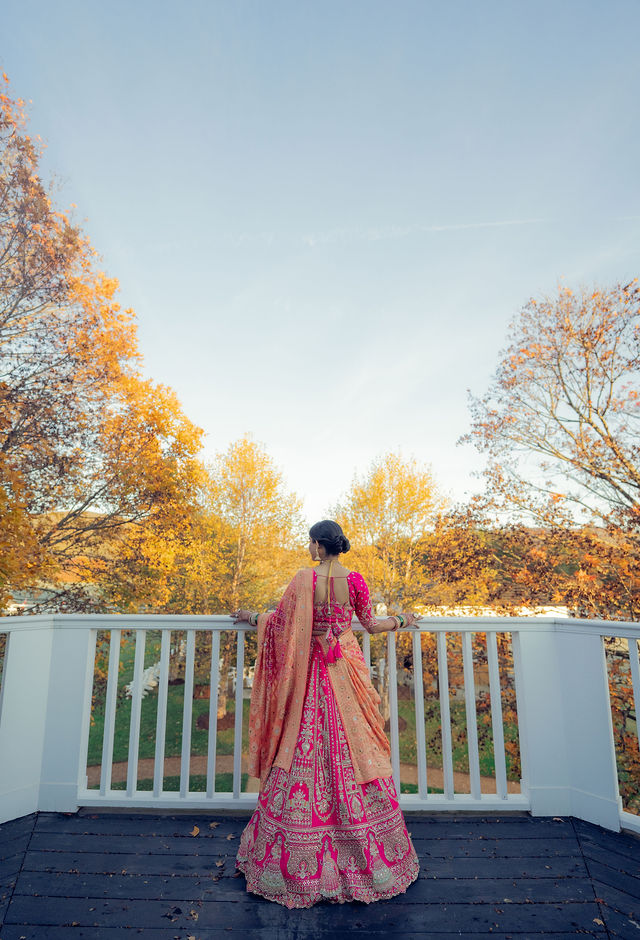 Monali on the balcony overlooking the autumn trees