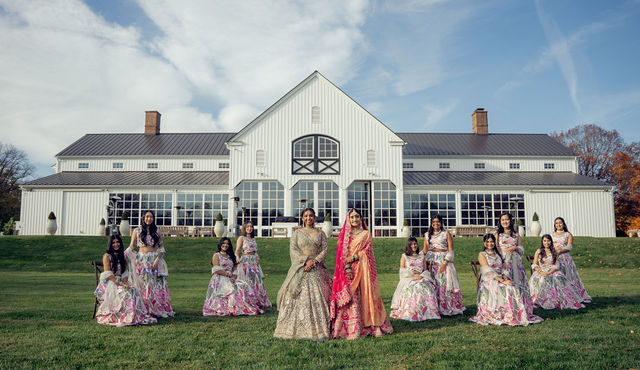 Monali with her wedding party in front of Castle Hill Cider