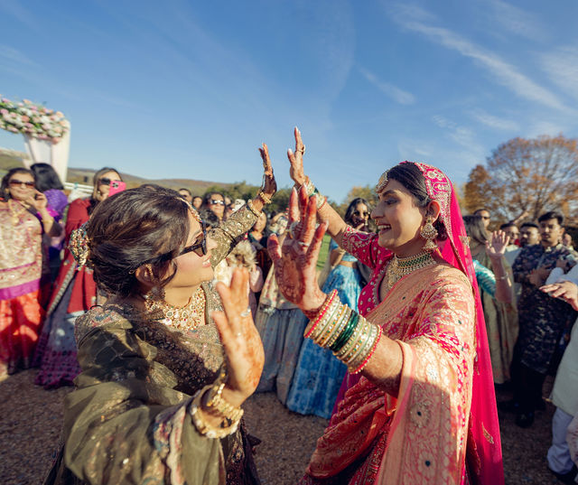 Monali celebrating with a loved one after the ceremony