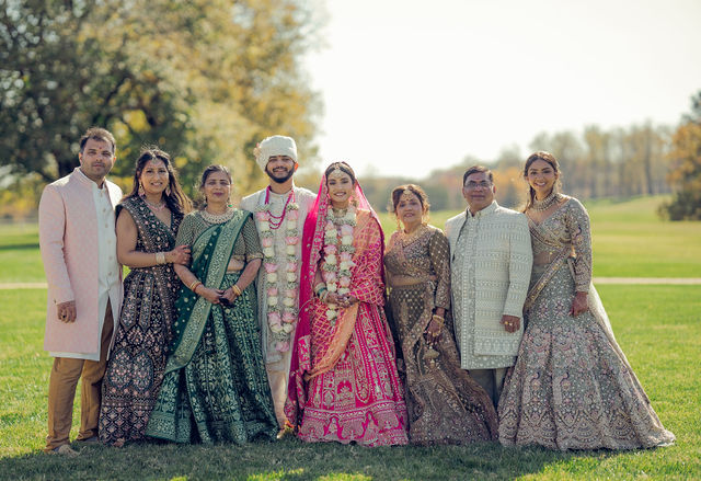 Monali and Sunny with their family on the wedding day