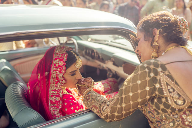 Monali bidding farewell through the car window