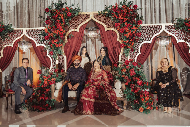 Naba and Ali with family at their wedding reception