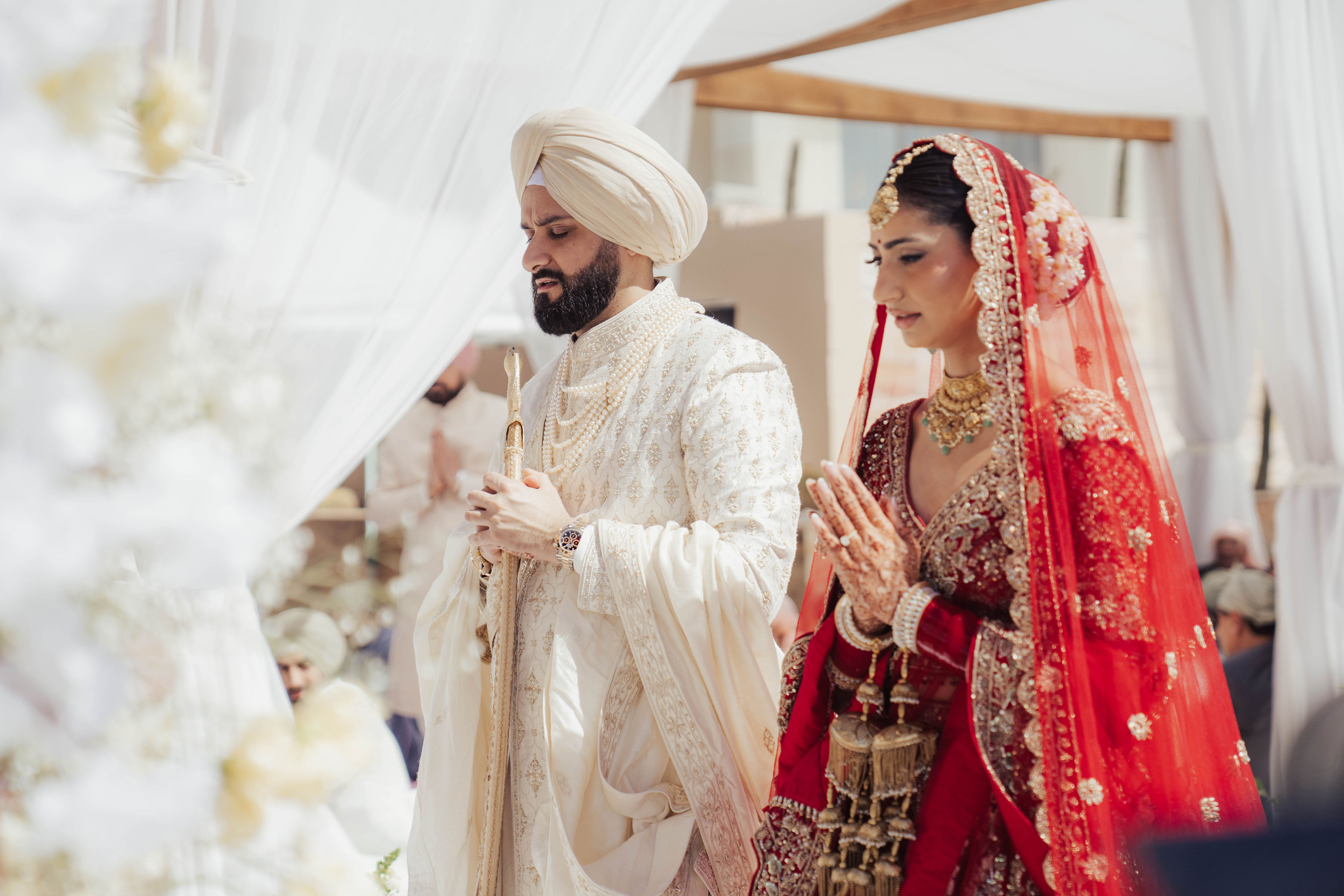 Paul and Gureet together beneath Gureet’s veil