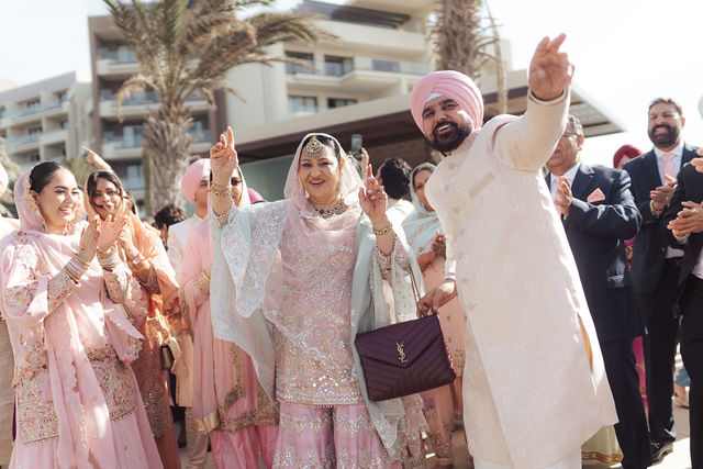 Family celebrating together during the baraat
