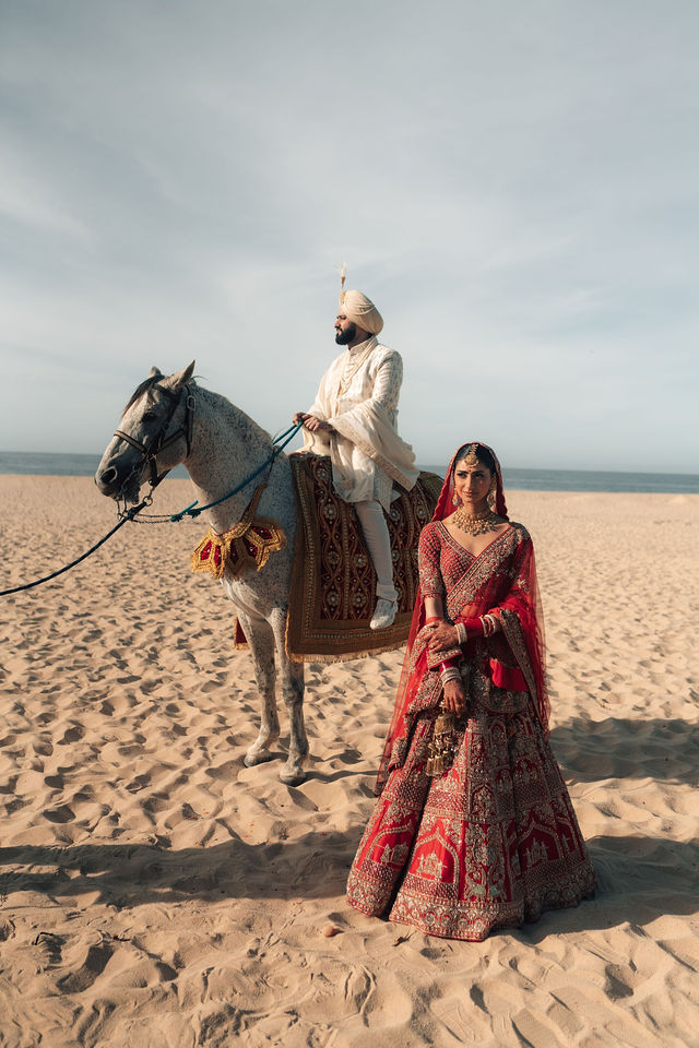 Paul on horseback beside Gureet on the sand