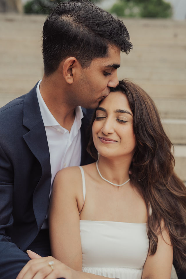Richa closing her eyes as Shahil holds her close