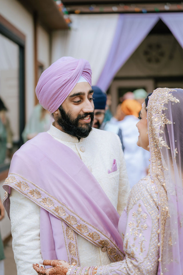 Sakhi and Amitoj embracing on their wedding day