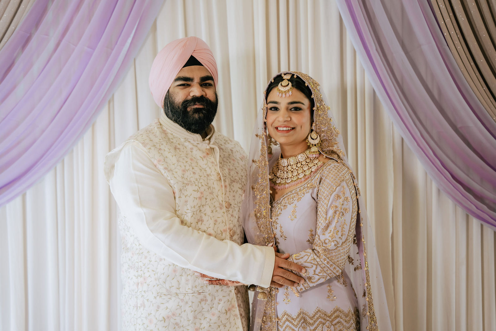 Sakhi and Amitoj in their Sikh wedding portrait