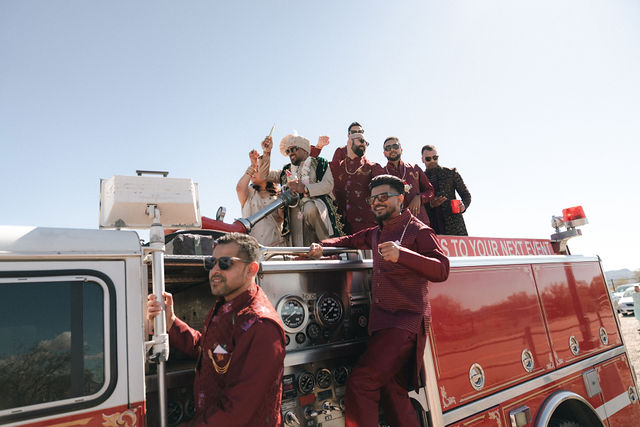 The wedding arrival on a red fire truck