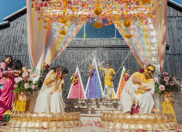 The couple's vivid Haldi setting at Saddle Woods Farm