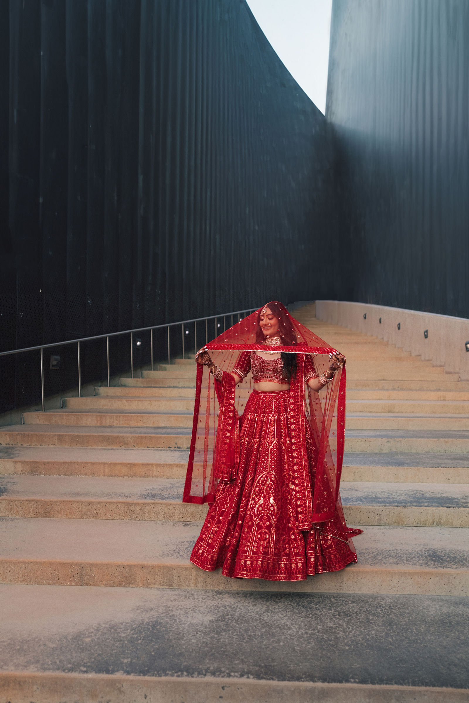 Sonalii in her red wedding veil