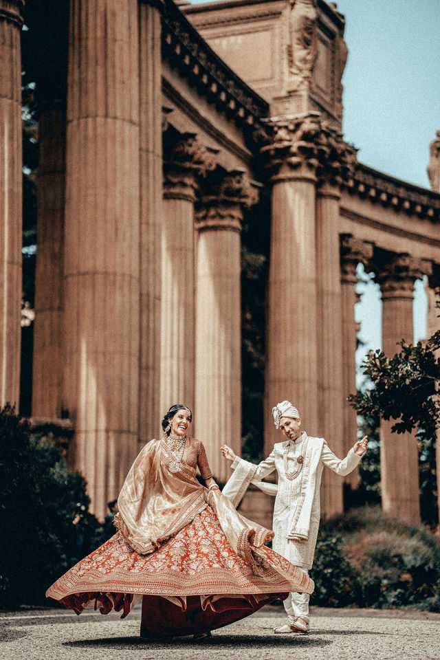 Vishalli in an expansive bridal portrait among the columns