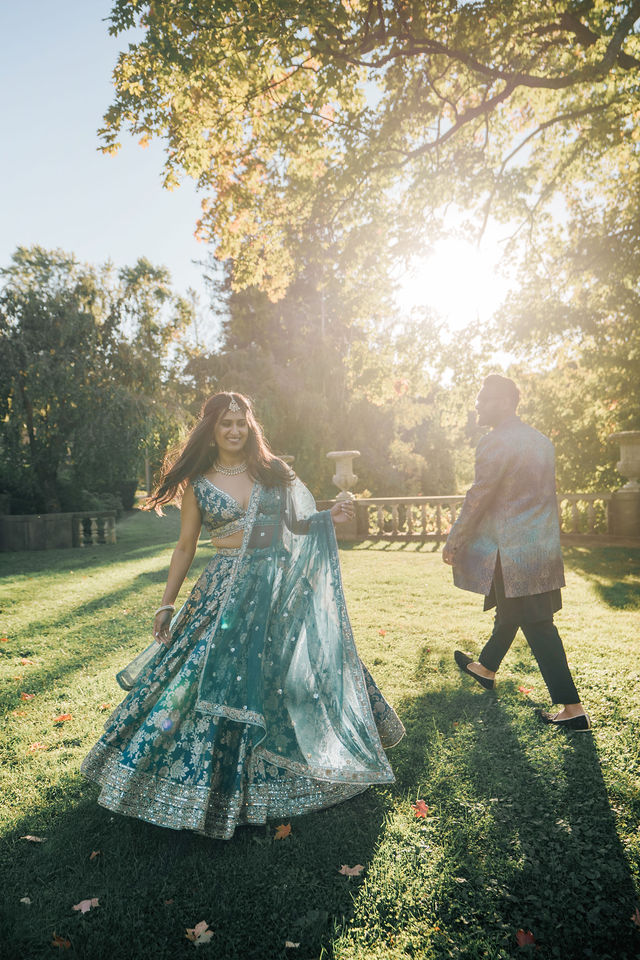 Vidhi in blue walking through warm afternoon light
