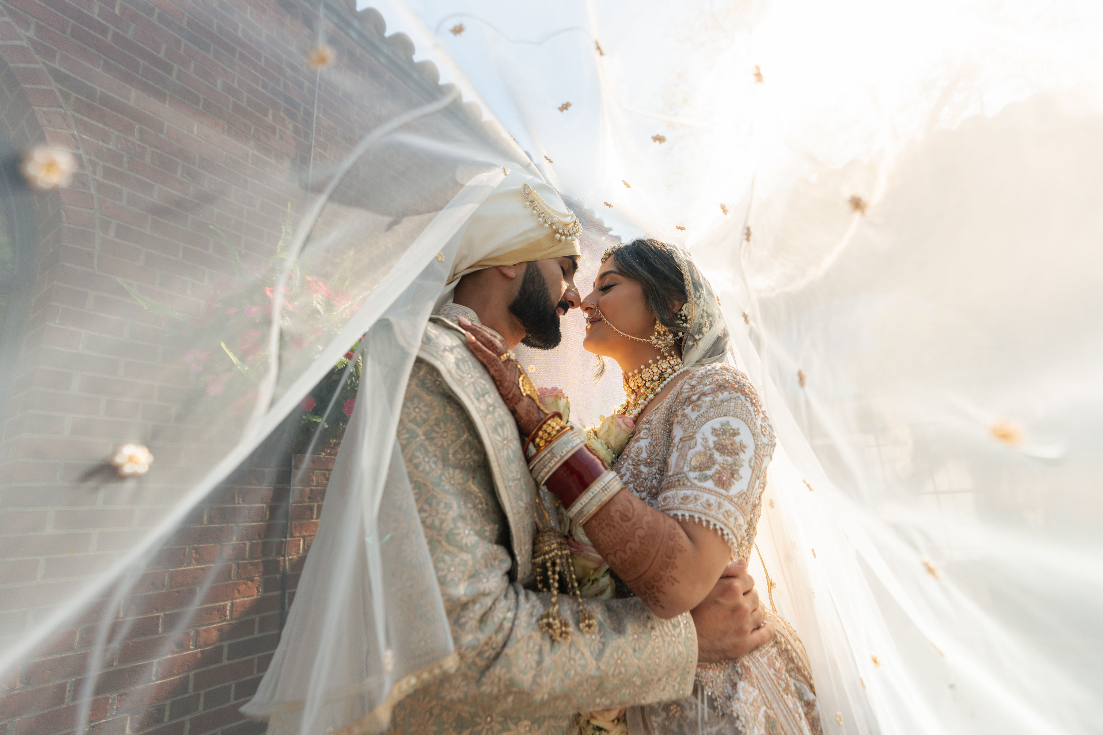 Varun and Nirali under a veil