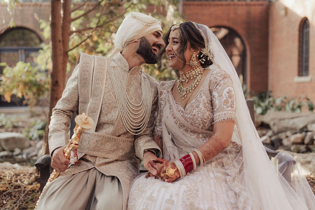 Varun and Nirali sit together in the garden
