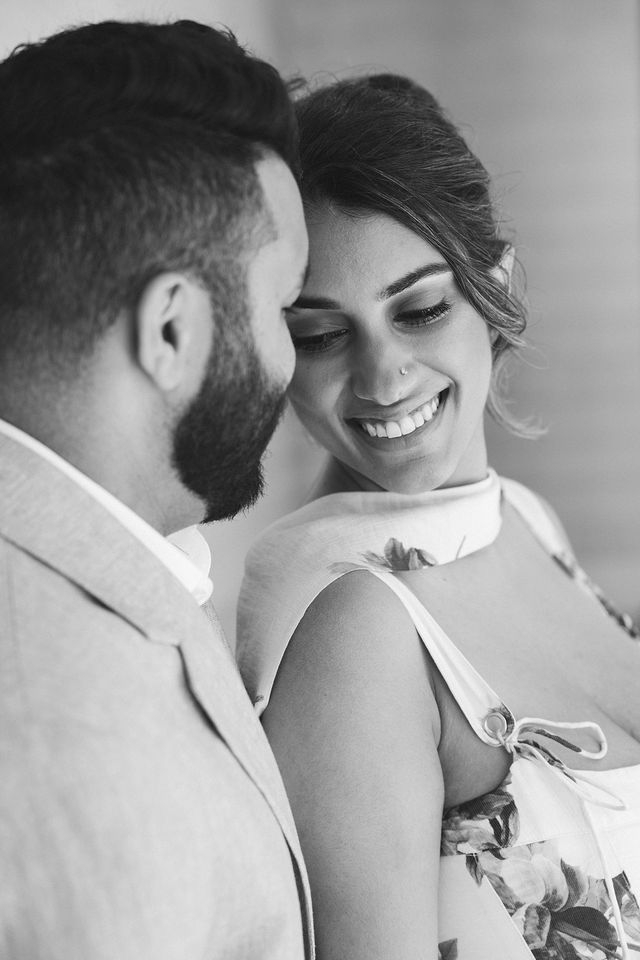 Yash and Parth sharing a close black-and-white portrait
