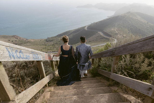 Yash and Parth descending a trail toward the Pacific coast